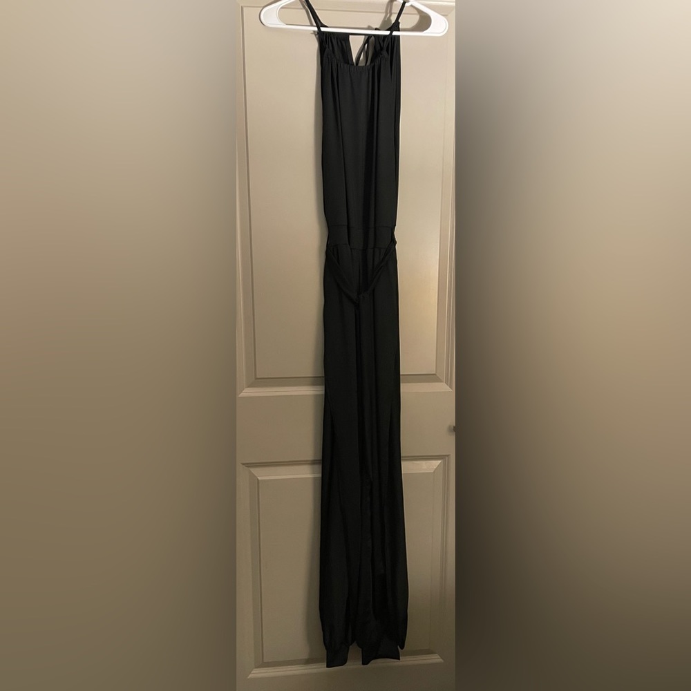 Fashion Nova black body suit with tie around waist, size small.